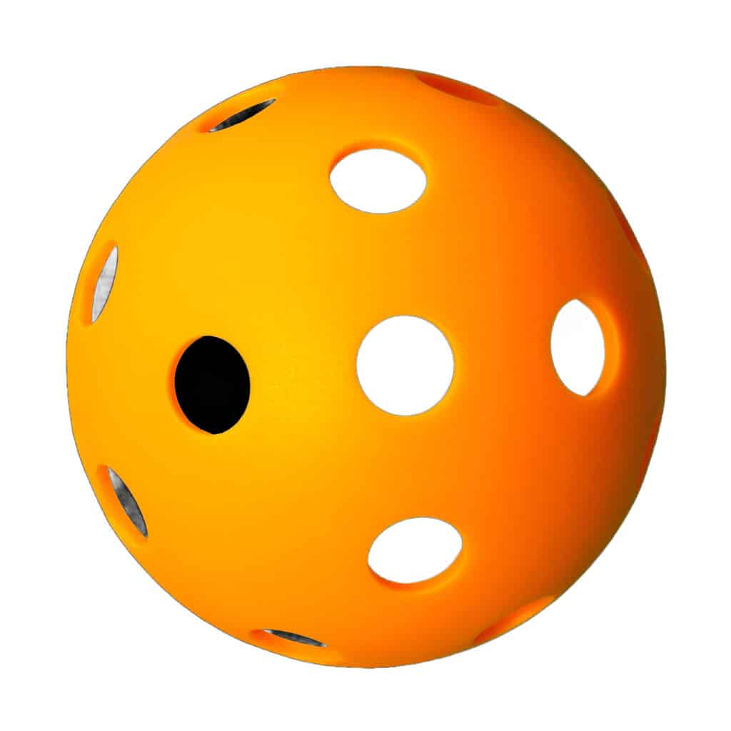 A bright orange plastic ball with multiple evenly spaced circular holes, typically used for sports like wiffle ball or pickleball, shown against a white background.